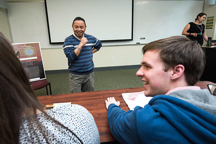 Al Fuertes teaches a class at Mason
