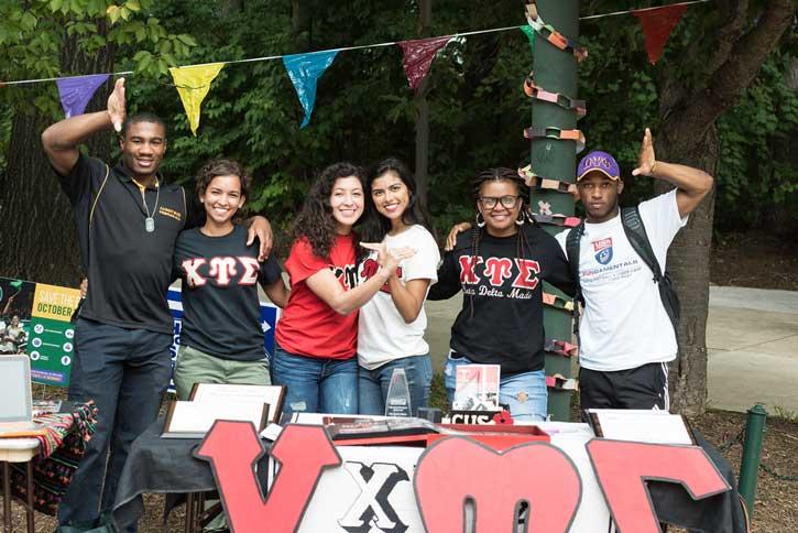 Chi Upsilon Sigma National Latin Sorority Stands for photo