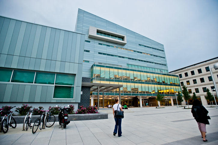 Visitors approach building at Mason's Arlington Campus
